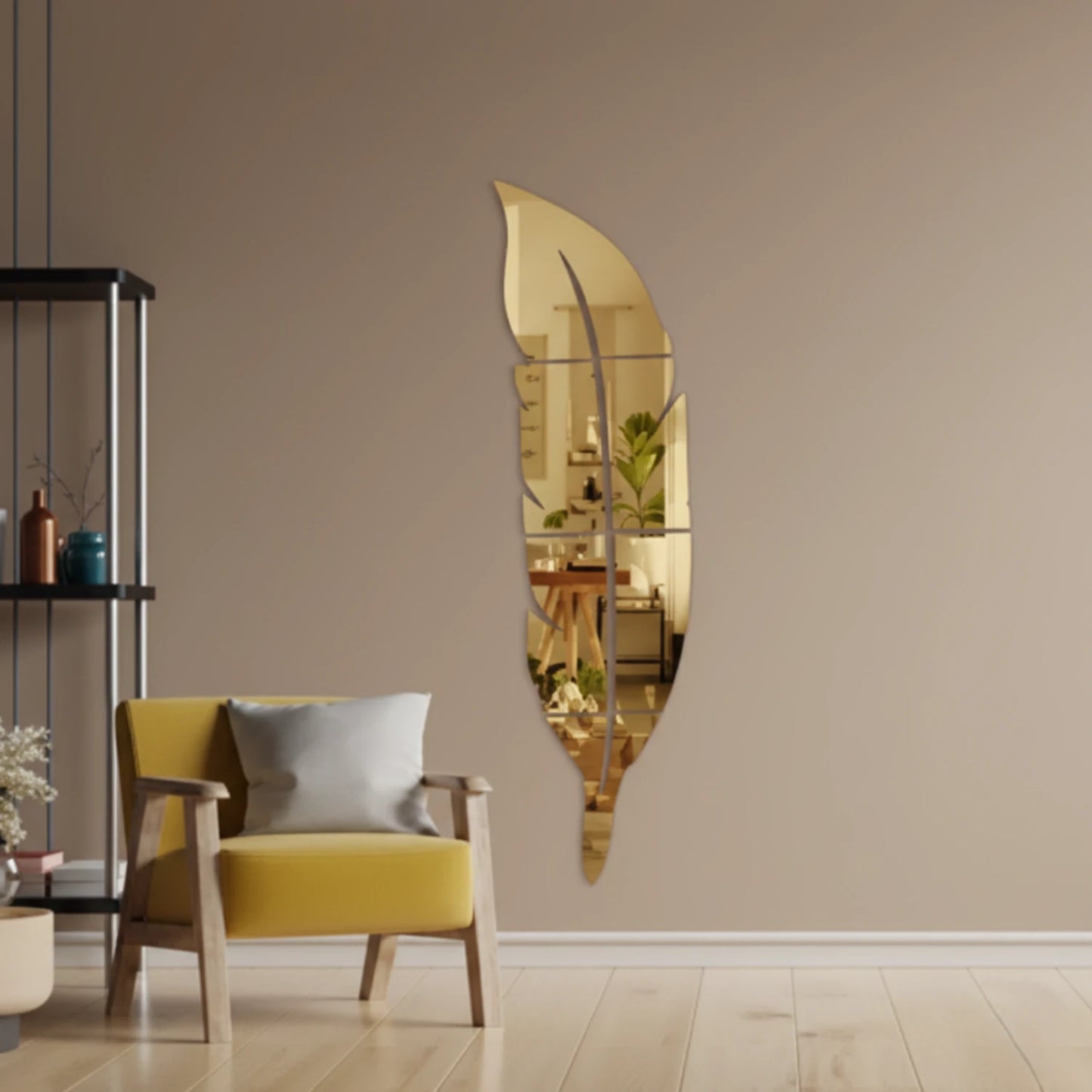 Gold acrylic leaf mirror wall art mounted in a modern living room