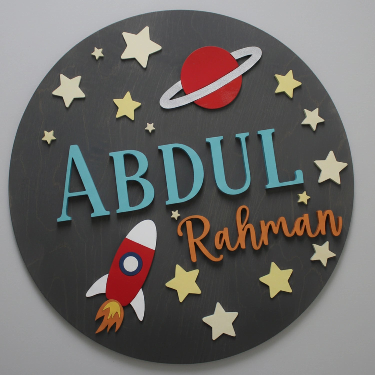 Personalized space theme name board with rockets and planets for kids room