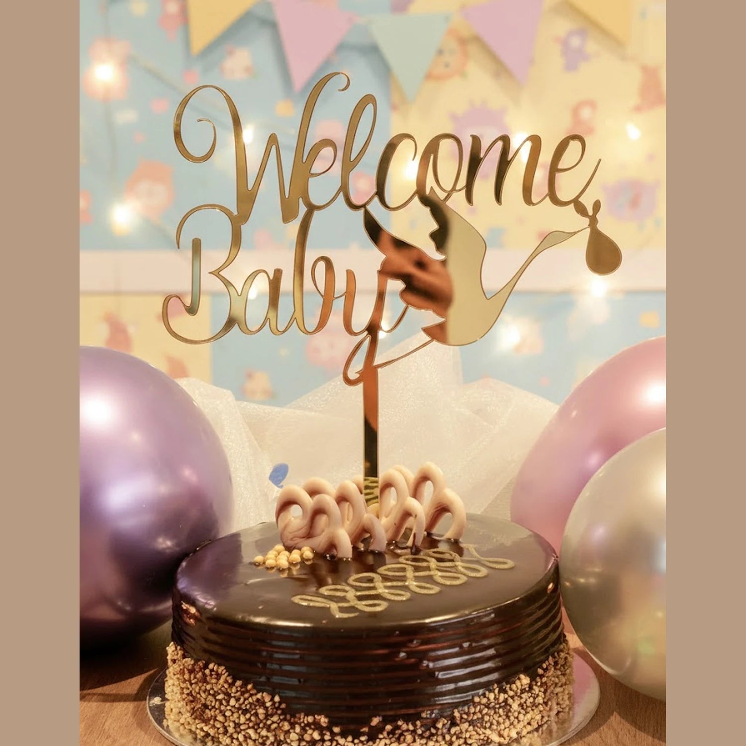 
welcome baby acrylic cake topper in gold for baby shower event celebration